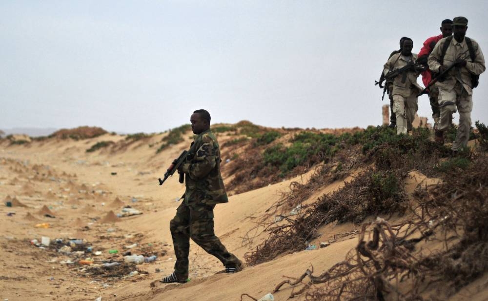 In this file photo taken on Dec. 18, 2016 Somali security forces patrol along the coast of Qaw, in Puntland, northeastern Somalia. Deployed in one of the world's most dangerous conflicts, Somali soldiers risking their lives daily against Al-Shabab insurgents were growing weary of being paid months late and shortchanged by their superiors. — AFP