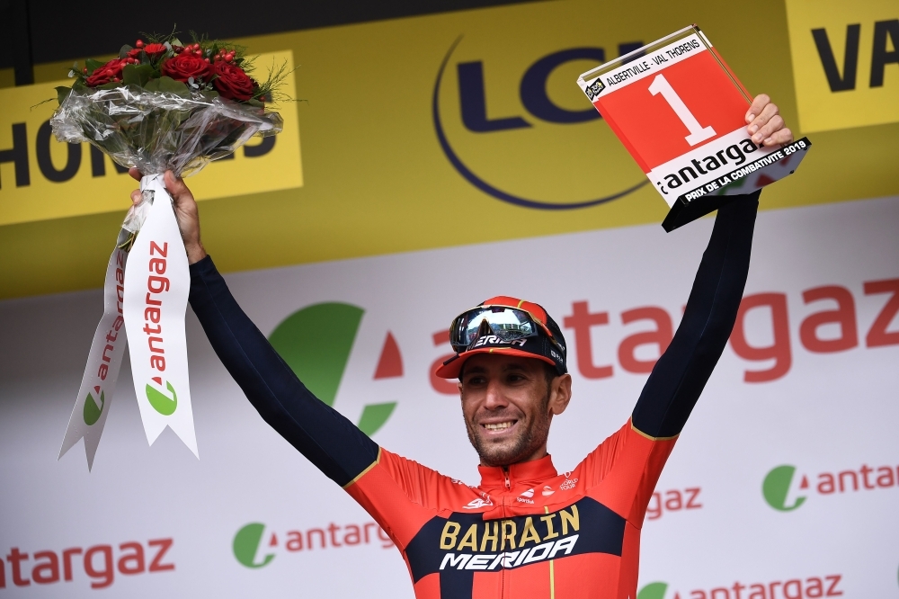 Italy's Vincenzo Nibali celebrates his prize for day's most combative rider on the podium of the twentieth stage of the 106th edition of the Tour de France cycling race between Albertville and Val Thorens, in Val Thorens, on Saturday. — AFP