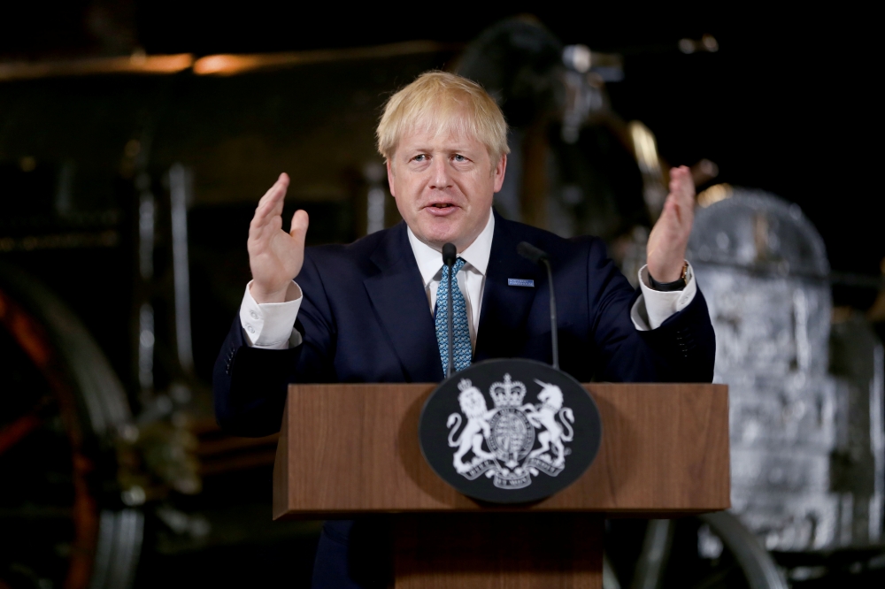 Britain's Prime Minister Boris Johnson gestures during a speech on domestic priorities at the Science and Industry Museum in Manchester, Britain on Saturday. — Reuters