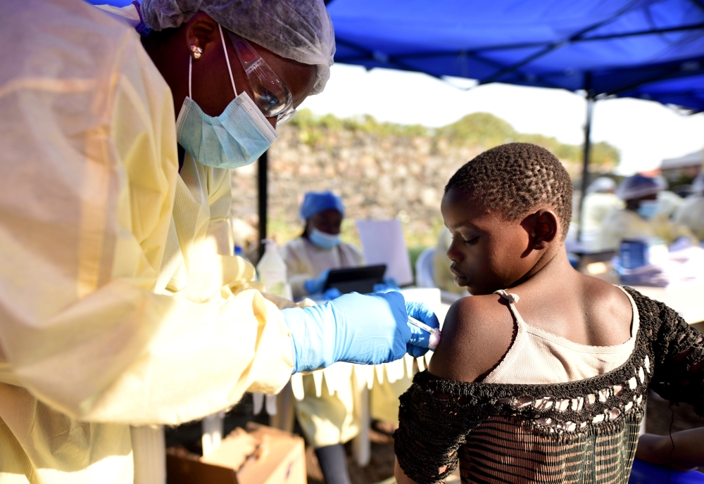 A Congolese health worker administers Ebola vaccine to a child at the Himbi Health Centre in Goma, Democratic Republic of Congo, on July 17. -Reuters photo