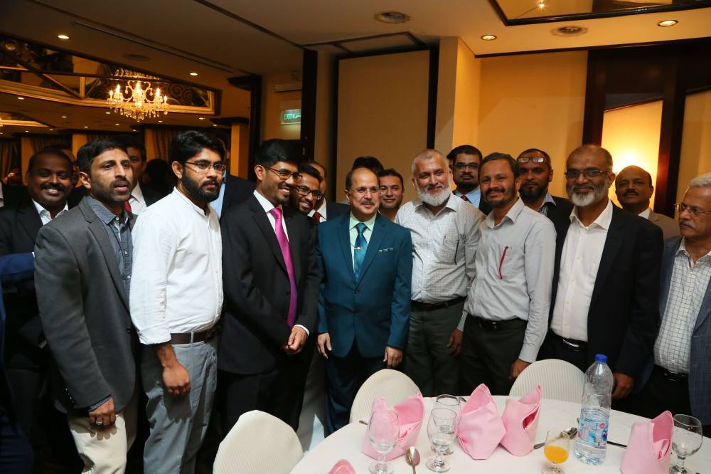 Consul General Md. Noor Rahman Sheikh felicitates the Ambassador Dr. Ausaf Sayeed.