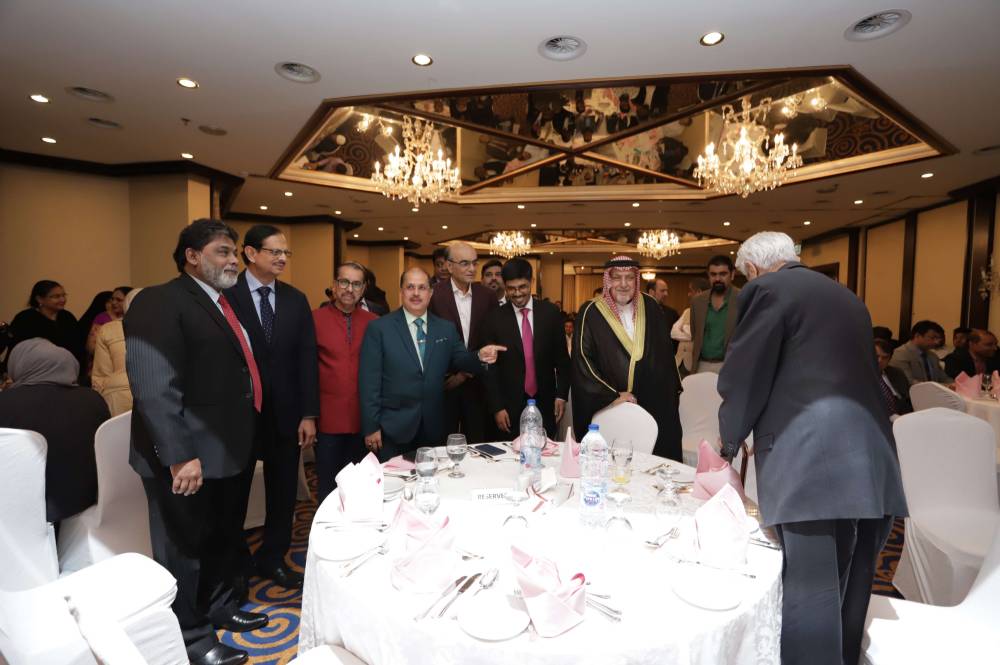 Consul General Md. Noor Rahman Sheikh felicitates the Ambassador Dr. Ausaf Sayeed.