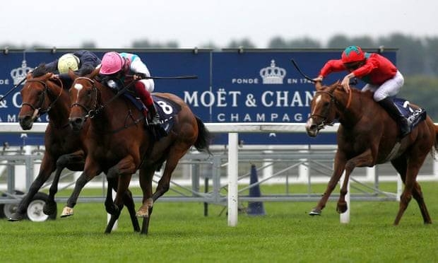 Enable, ridden by Frankie Dettori in the pink cap, beats Crystal Ocean and Waldgeist in an epic renewal of the King George & Queen Elizabeth Stakes at Ascot. — Courtesy photo