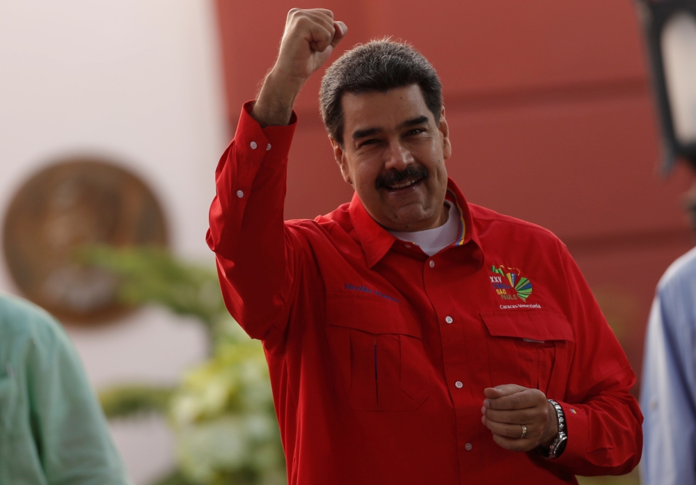 Venezuela's President Nicolas Maduro arrives for a meeting of the Sao Paulo Forum in Caracas, Venezuela on Sunday. -Reuters photo