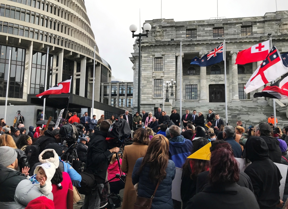 Ministers address hundreds of Maori protesters gathered to demonstrate against what protesters say is the disproportionate number of Maori children taken by social service agencies from their families, outside parliament in Wellington, New Zealand, on Tuesday. -Reuters photo