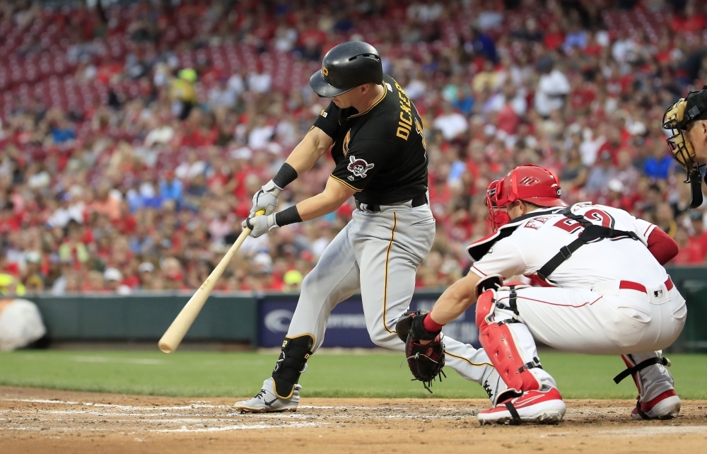 Corey Dickerson of the Pittsburgh Pirates hits a two RBI single in the third inning against the Cincinnati Reds at Great American Ball Park on July 30, 2019 in Cincinnati, Ohio, on Tuesday. — AFP