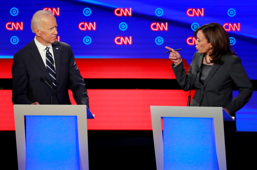US Senator Kamala Harris, right, points at former Vice President Joe Biden on the second night of the second 2020 Democratic US presidential debate in Detroit, Michigan, on Wednesday. — Reuters