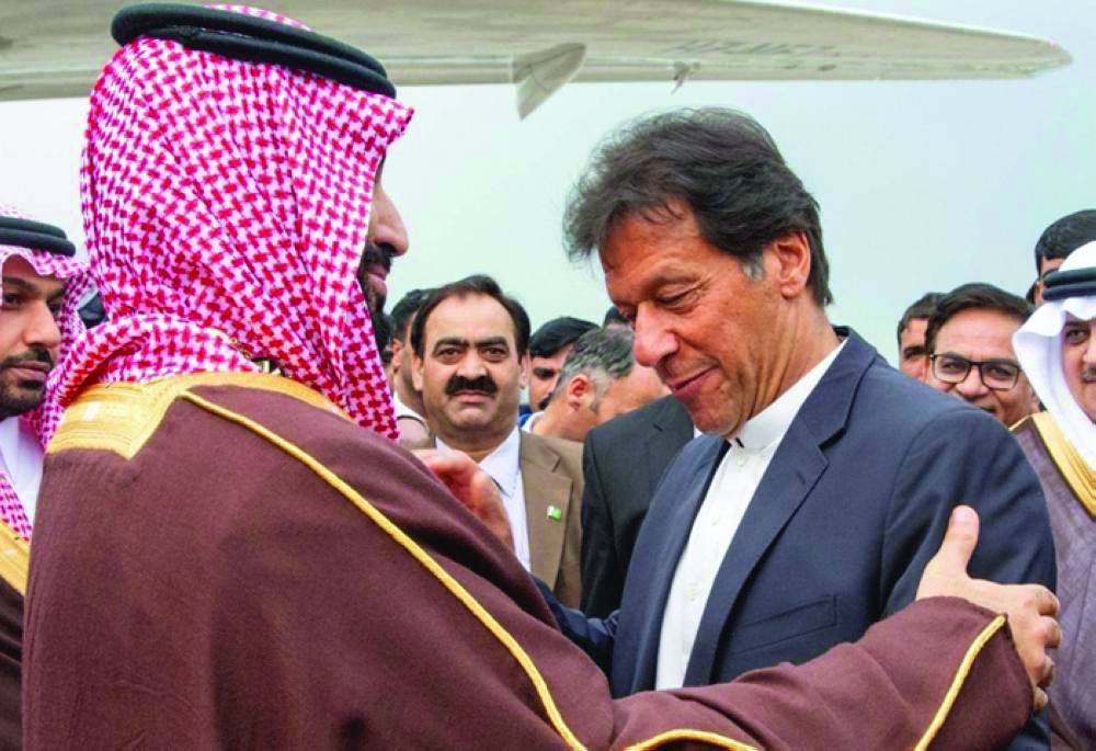 Crown Prince Muhammad Bin Salman is being seen off at Noor Khan Air Base in Rawalpindi, Pakistan, by Pakistani Prime Minister Imran Khan in this file photo. — SPA 