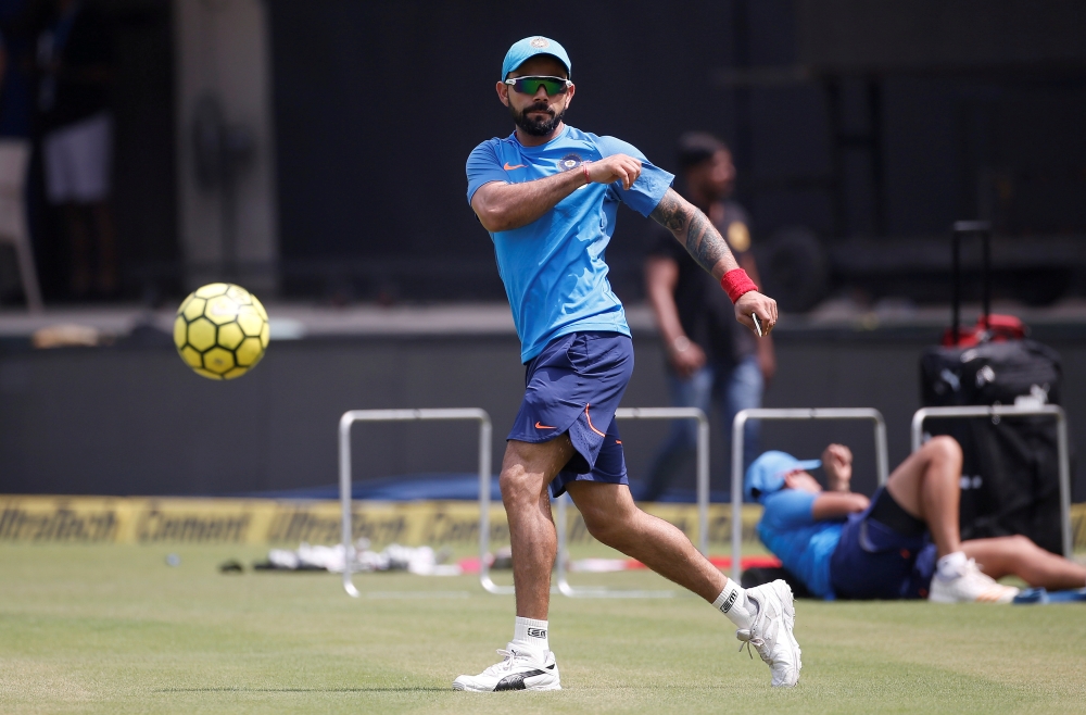 Virat Kohli plays with a soccer ball during team's practice session before the match against Australia at Indore, India, in this Sept. 23, 2017 file photo. — Reuters

