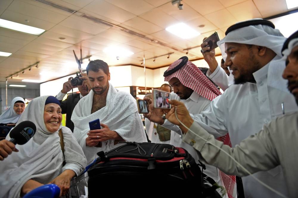 Families of victims of the March 2019 attack on mosques in New Zealand, arrive at Jeddah airport on Friday, prior to the start of the annual Haj pilgrimage in the holy city of Makkah.  