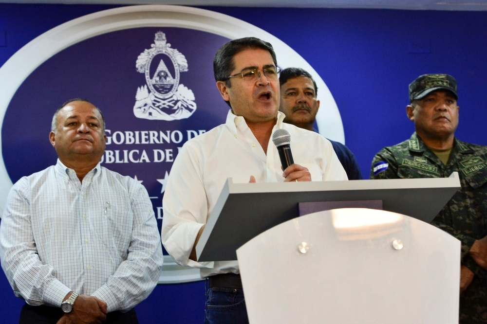  President Juan Orlando Hernandez of Honduras speaks during a press conference at the Presidential House in Tegucigalpa, Honduras, on Saturday. Hernandez denied accusations of being co-conspirator in a drug trafficking and money laundering case, according to a document filed in a US court on Friday. -Courtesy photo
