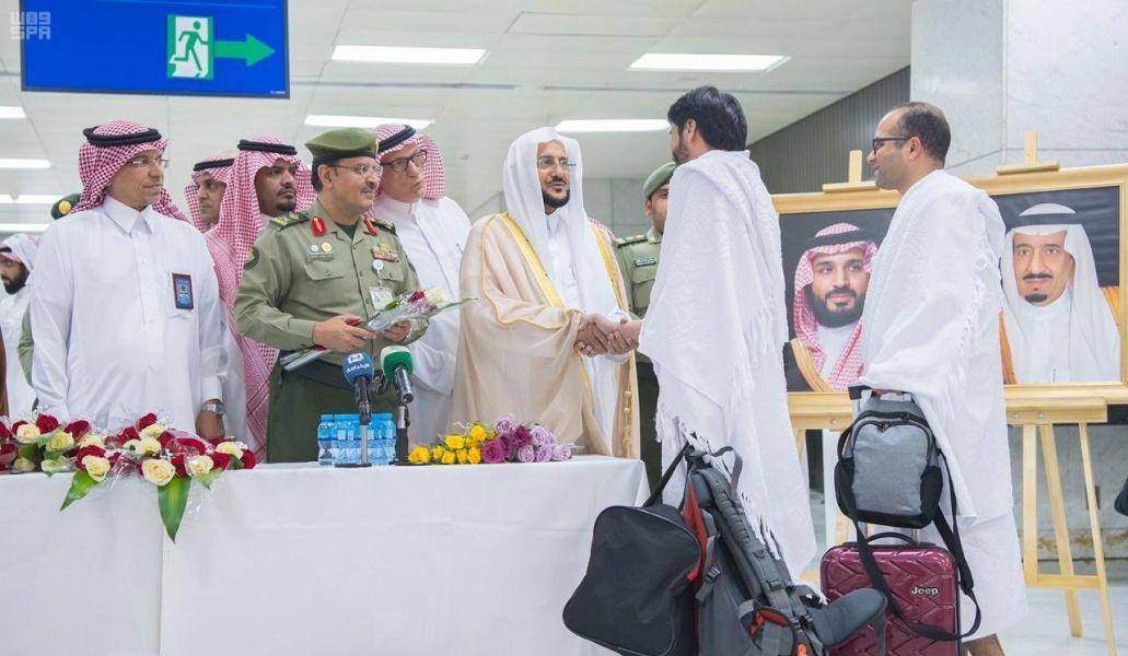 Family members of the Christchurch mosque massacre with officials at the Jeddah airport. — Courtesy photos 