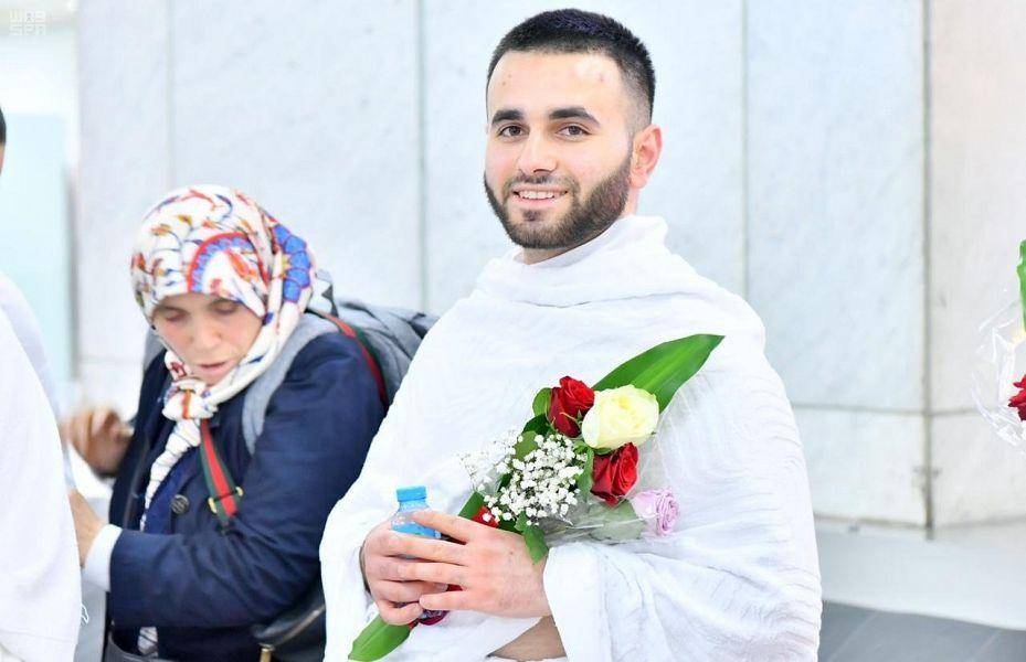 Family members of the Christchurch mosque massacre with officials at the Jeddah airport. — Courtesy photos 