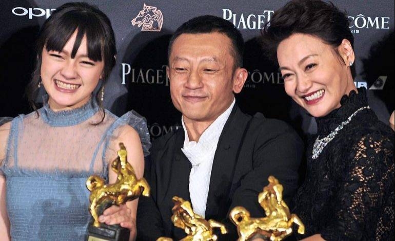 Taiwanese actress Vicky Chen (left), Taiwanese director Yang Ya-che and Hong Kong actress Kara Wai after their film 'The Bold, The Corrupt, And The Beautiful' wins Best Film at Taiwan's 54th Golden Horse film awards in this file photo. — AFP