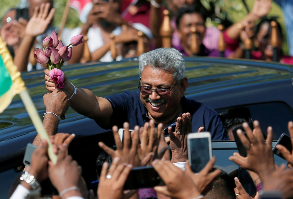 Sri Lanka's former defense secretary Gotabaya Rajapaksa greets his supporters after his return from the United States, in Katunayake, Sri Lanka, in this April 12, 2019 file photo. — Reuters