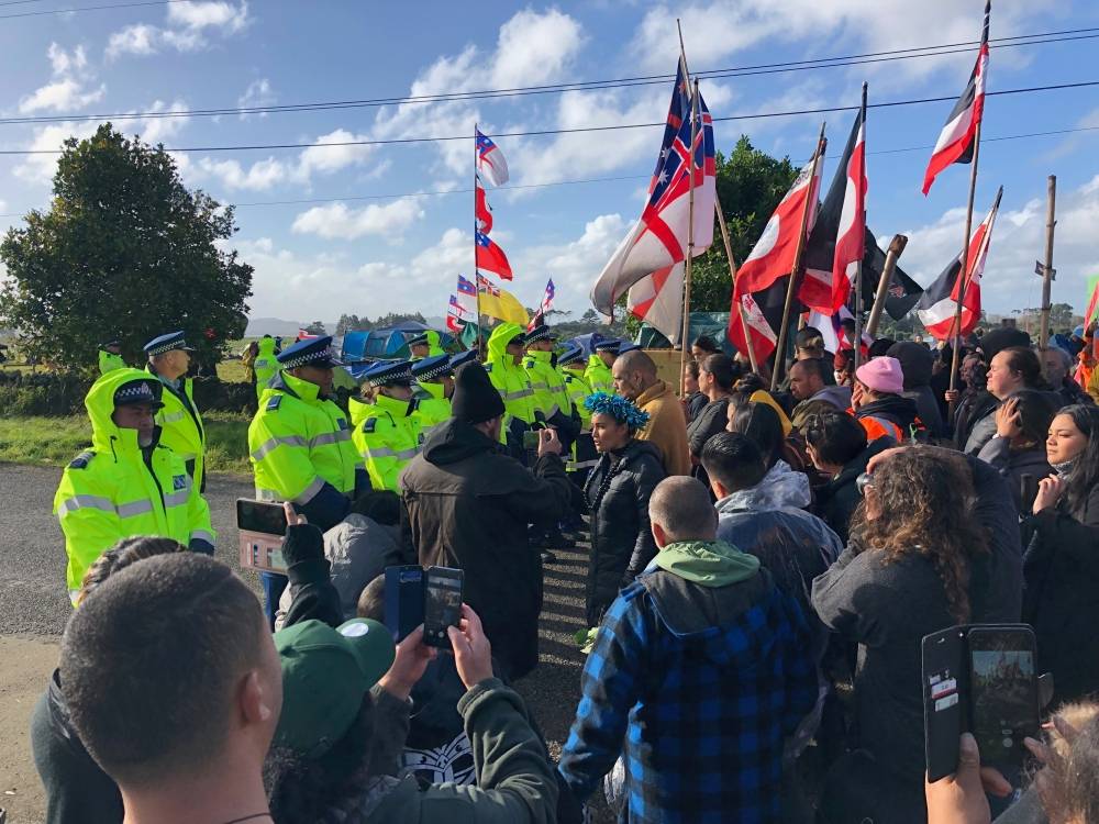 Protest leader Pania Newton (C) is seen at a protest at Ihumatao, Auckland, in this undated handout photo released on Sunday. -Reuters