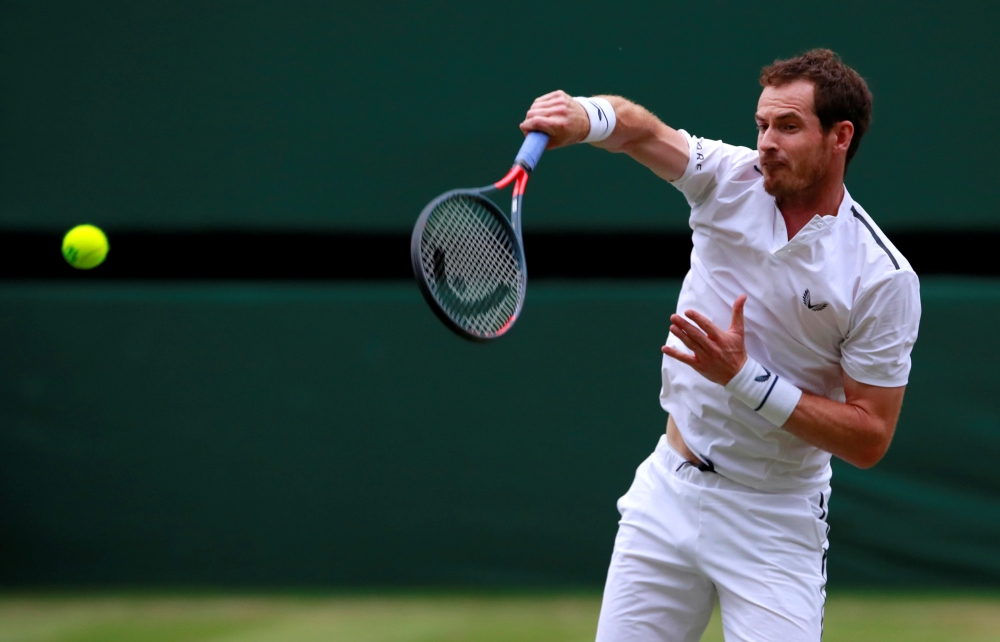 Britain's Andy Murray in action during his second round mixed doubles match against France's Fabrice Martin and Raquel Atawo of the at All England Lawn Tennis and Croquet Club, London, in this July 9, 2019 file photo. — Reuters