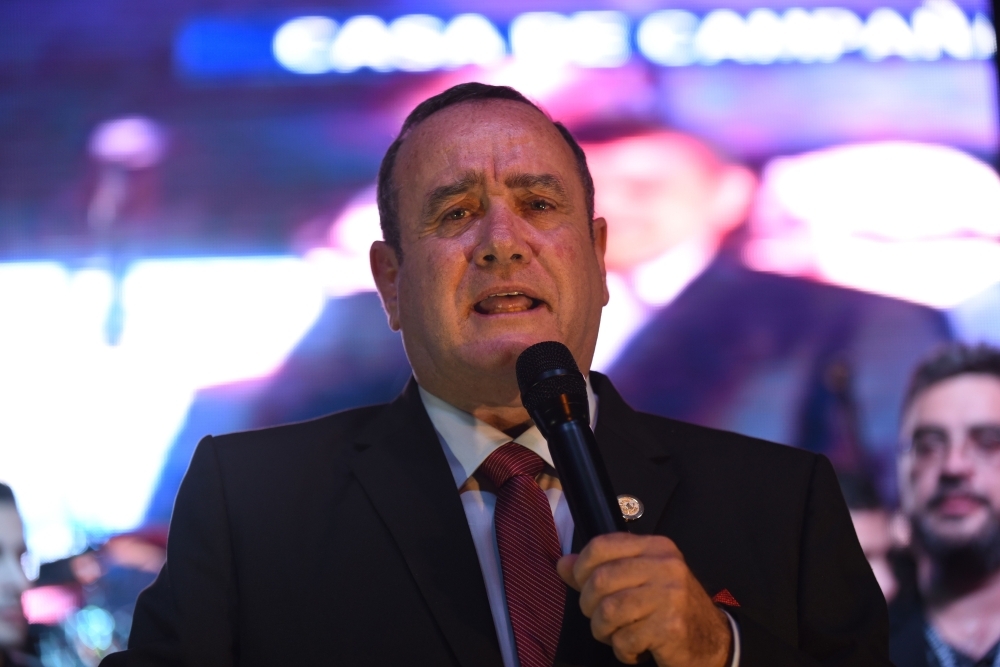 Guatemalan presidential candidate for the Vamos (Let's Go) party Alejandro Giammattei speaks to supporters at the party headquarters in Guatemala City on Sunday after the run-off presidential election. — AFP