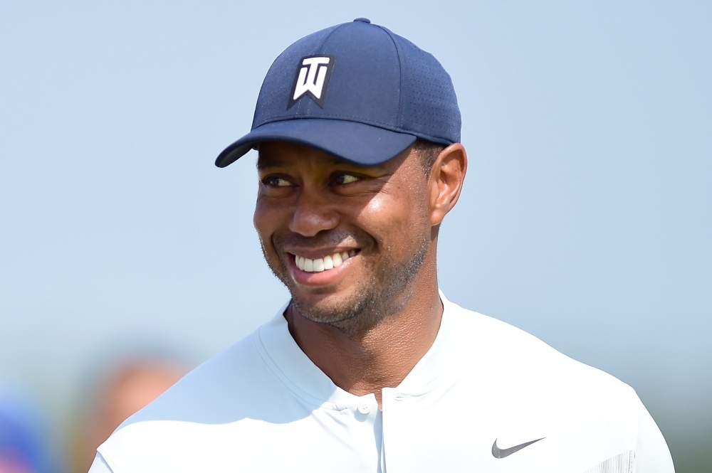 Tiger Woods of the United States looks on from the second tee during the first round of The Northern Trust at Liberty National Golf Club in Jersey City, New Jersey, in this Aug. 8, 2019 file photo. — AFP