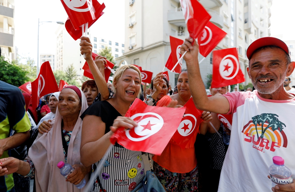 Supporters react after Tunisian Prime Minister Youssef Chahed submitted his candidacy for the presidential elections in Tunis in this Aug. 9, 2019 file photo. — Reuters