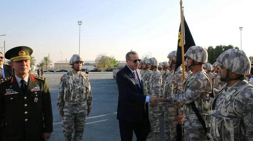 Turkey's President Recep Tayyip Erdogan reviews Turkish troops during his visit at the Qatari-Turkish Armed Forces Land Command Base in Doha in this Nov. 15, 2017 file photo. — Reuters