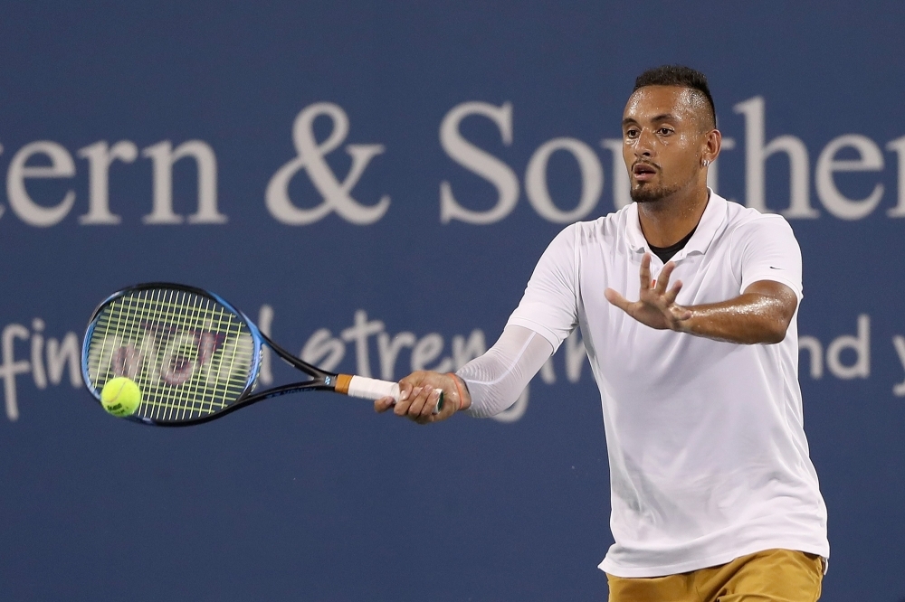 Nick Kyrgios of Australia returns a shot to Karen Khachanov of Russia during the Western & Southern Open at Lindner Family Tennis Center in Mason, Ohio, on Wednesday. — AFP