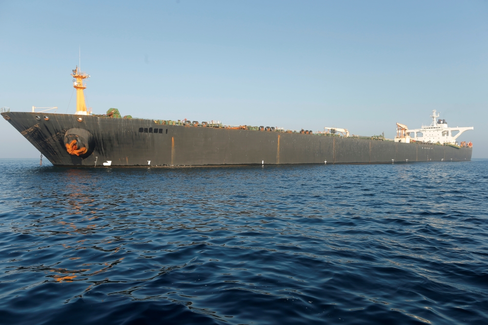 The name of Iranian oil tanker Grace 1 is seen removed as it sits anchored after the Supreme Court of the British territory lifted its detention order, in the Strait of Gibraltar, southern Spain, on Friday. — Reuters