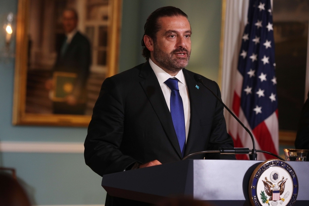 Lebanese Prime Minister Saad Hariri makes remarks to members of the media after a meeting with U.S. Secretary of State Mike Pompeo at the State Department in Washington, DC. (AFP)
