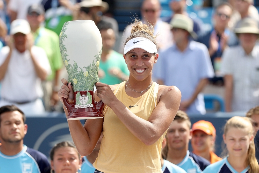 Madison Keys poses for photographers after defeating Svetlana Kuznetsova of Russia in the women's final during the Western & Southern Open at Lindner Family Tennis Center, Mason, Ohio, on Sunday. — AFP