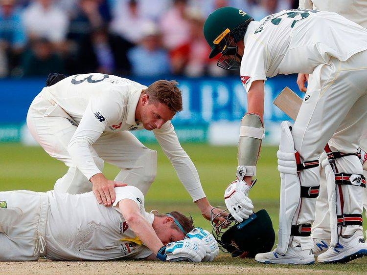 Australia's Steve Smith lays on the pitch after being hit in the neck by a ball off the bowling of England's Jofra Archer during play on the fourth day of the second Ashes Test match at Lord's Cricket Ground in London, on Saturday. — AFP 