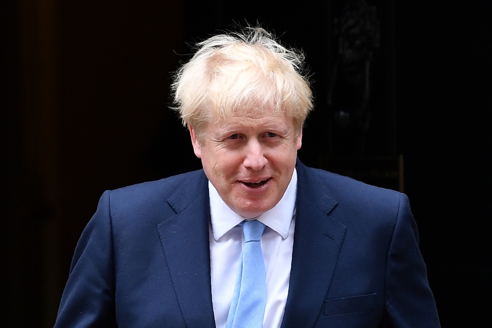 Britain's Prime Minister Boris Johnson is seen outside 10 Downing Street in London in this Aug. 07, 2019 file photo. — AFP