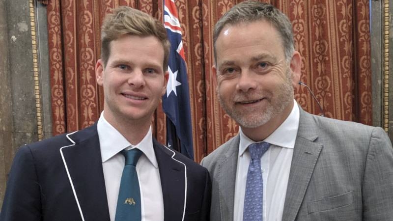Australian batsman Steve Smith (L) with UK Sports Minister Nigel Adams at a function last week. — Courtesy photo