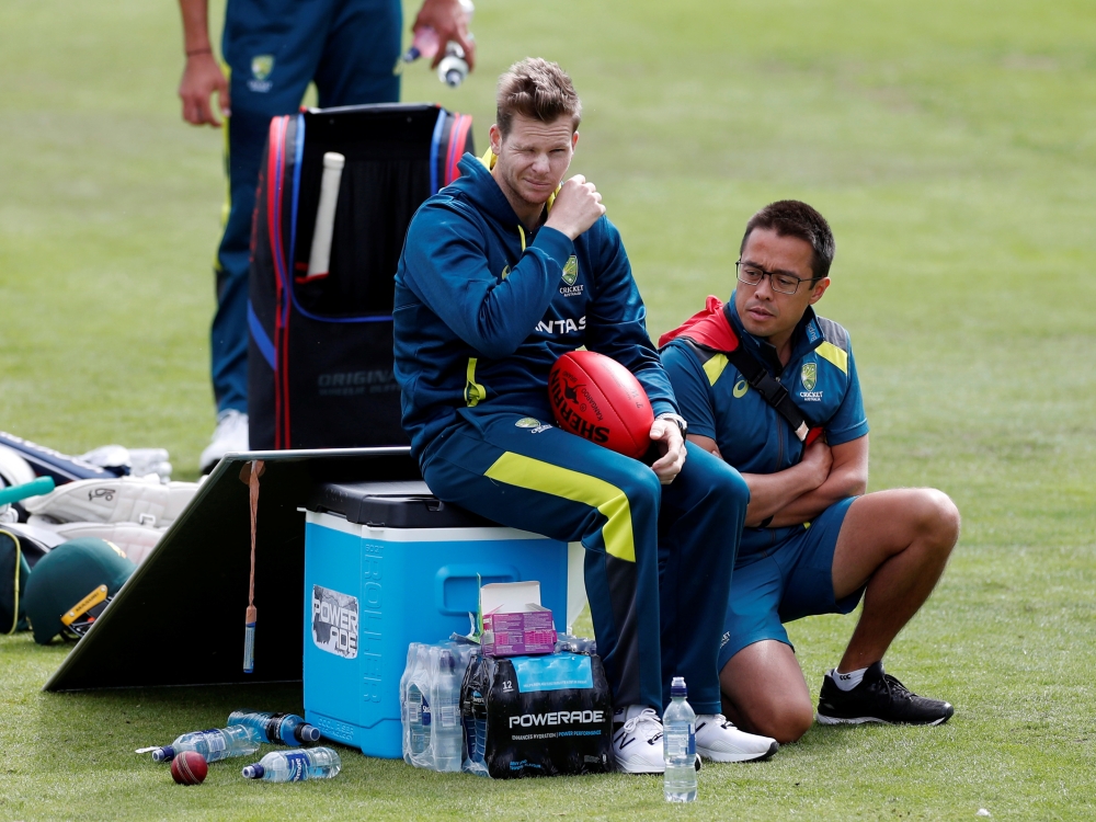 Australia's Steve Smith with team doctor Richard Saw during nets at Headingley, Leeds, Britain, on Tuesday. — Reuters