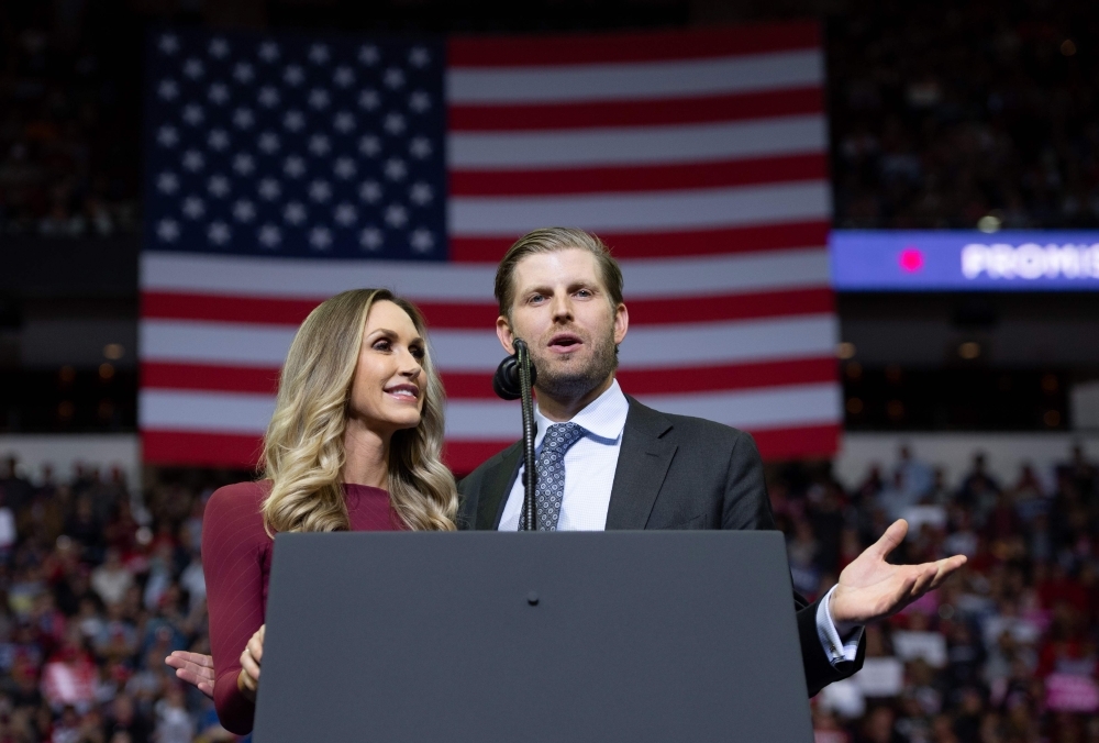 Eric and Lara Trump speak during a campaign rally hosted by US President Donald Trump at the Toyota Center in Houston, Texas, in this Oct. 22, 2018 file photo. — AFP