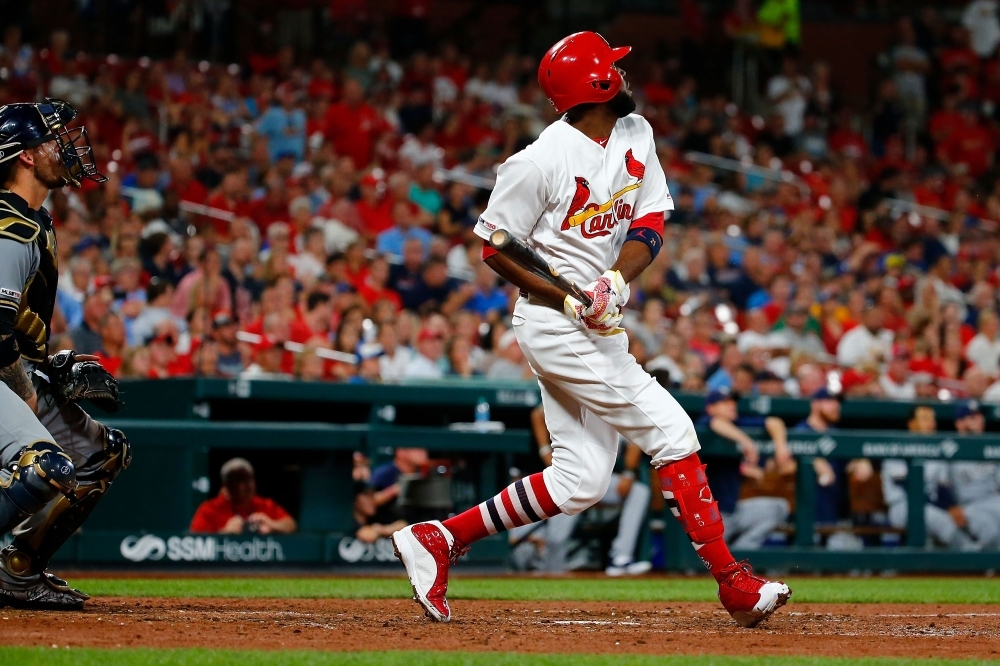 Dexter Fowler of the St. Louis Cardinals hits a three-run double against the Milwaukee Brewers in the sixth inning at Busch Stadium in St Louis, Missouri, on Tuesday. — AFP