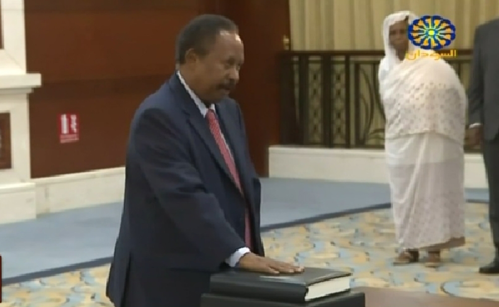 This screen grab taken from Sudan TV on Wednesday shows Abdallah Hamdok during a swearing in ceremony in the Sudanese capital Khartoum.  — AFP