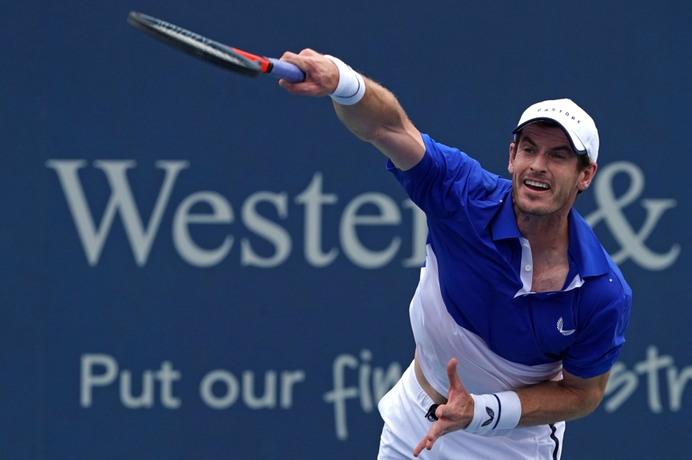 In this file photo taken on Aug 12, 2019, Andy Murray (GBR) serves against Richard Gasquet (FRA) during the Western and Southern Open tennis tournament at Lindner Family Tennis Center, Mason, OH, USA. — Reuters