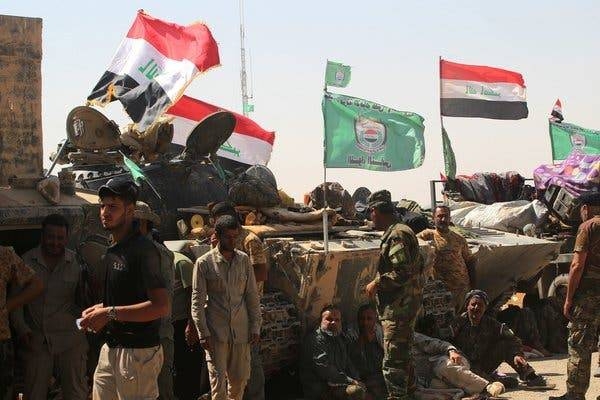 Members of a militia with the Popular Mobilization Forces are seen at the Tal Afar airport, west of Mosul, Iraq, in 2017 file photo. — AFP