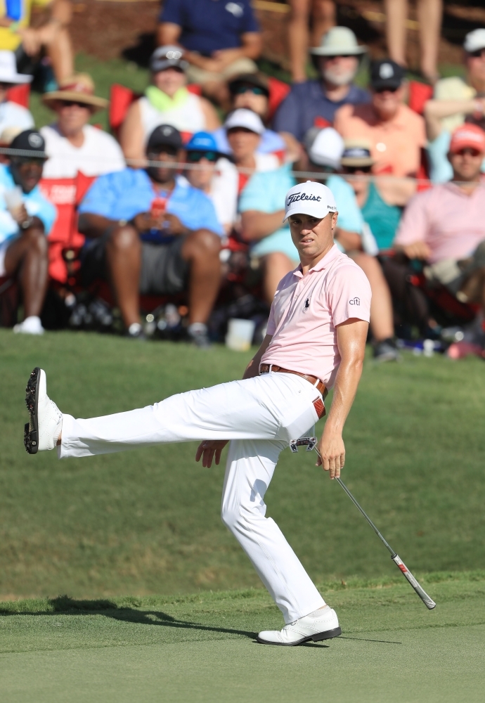 Thomas of the United States reacts on the 18th green during the first round of the TOUR Championship at East Lake Golf Club in Atlanta, Georgia, on Thursday. — AFP