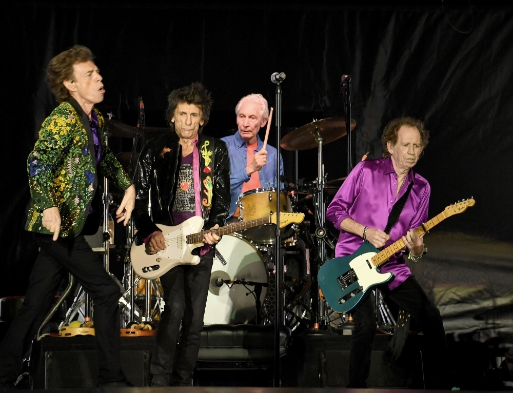 Mick Jagger, left, Ronnie Wood, second left, Charlie Watts, second right, and Keith Richards, right, of The Rolling Stones perform onstage at Rose Bowl in Pasadena, California, on Thursday. — AFP