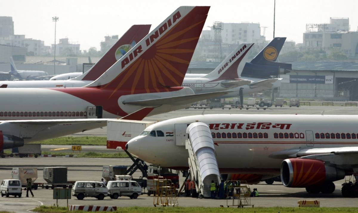 Air India aircraft stand on the tarmac at the airport in Mumbai, India, in this Sept. 27, 2009 file photo. — Reuters