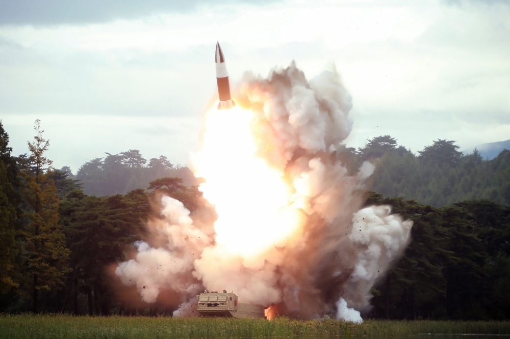  This file photo taken on August 16, 2019 and released on August 17 by North Korea's official Korean Central News Agency (KCNA) shows the test-firing of a new weapon, presumed to be a short-range ballistic missile, at an undisclosed location. -AFP