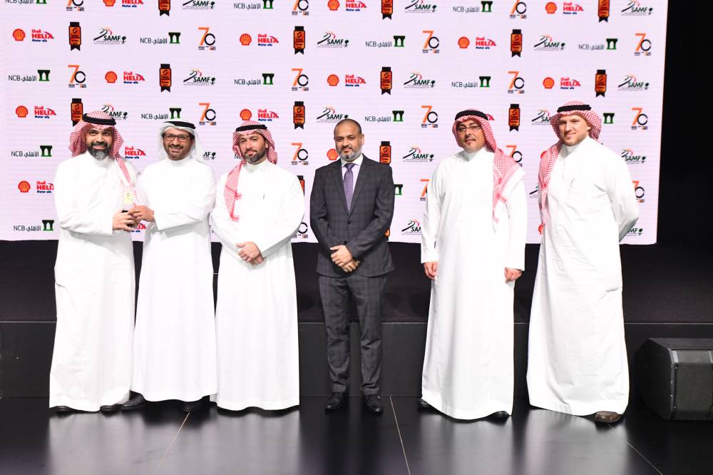 Mark Notkin, Managing Director at Mohammed Yousuf Naghi Motors, with other officials at the awarding ceremony