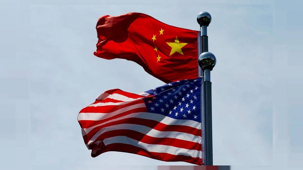 Chinese and US flags flutter near The Bund, before US trade delegation meet their Chinese counterparts for talks in Shanghai, China July 30, 2019. -Reuters
