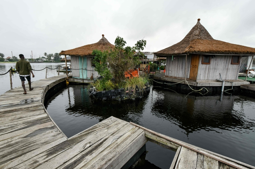 This file photo taken on August 6, 2019 shows a view of the resort on an artificial island made with around 700,000 recycled pieces of plastic waste collected in the surrounding area, on the Ebrie Lagoon in Abidjan, Ivory Coast. -AFP