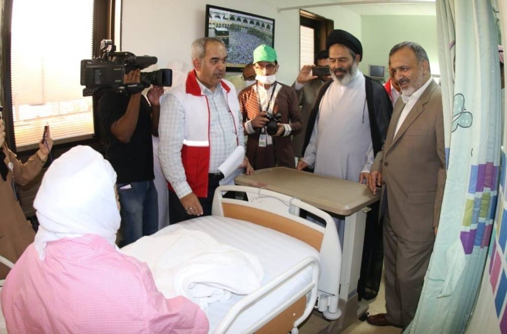 Iranian Haj officials visit a sick Iranian pilgrim in Al-Noor Specialist Hospital, Makkah. — SPA