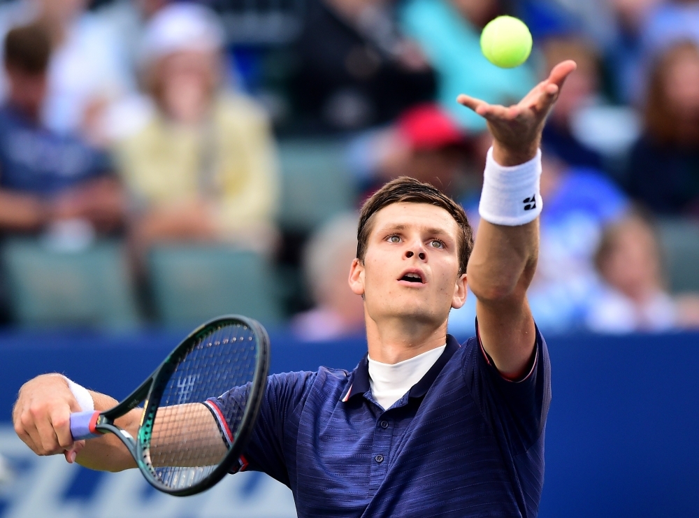 Hubert Hurkacz of Poland serves to Benoit Paire of France during the men's singles championship final on day eight of the Winston-Salem Open at Wake Forest University in Winston Salem, North Carolina, on Saturday. — AFP