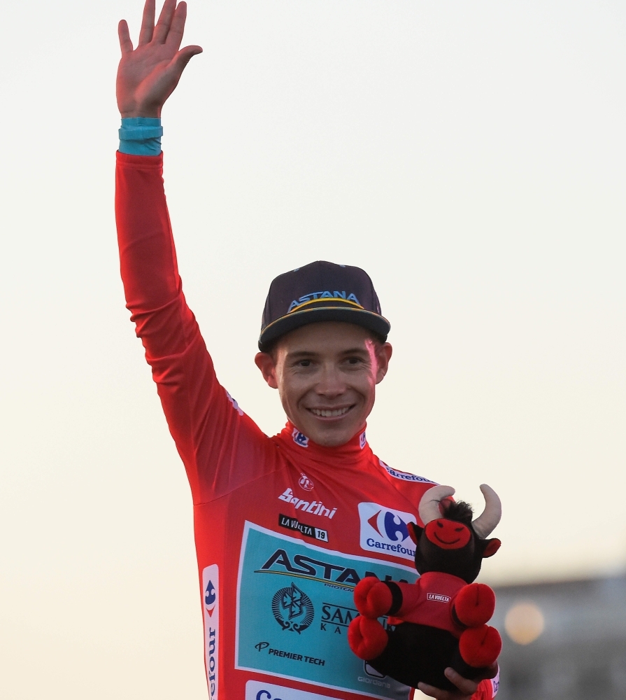 Astana Pro Team Colombian cyclist Miguel Angel Lopez Moreno celebrates on the podium weating the red jersey after the first stage of the 2019 La Vuelta cycling tour of Spain, a 13.4 km race against the clock between Salinas de Torrevieja and Torrevieja, on Saturday. — AFP