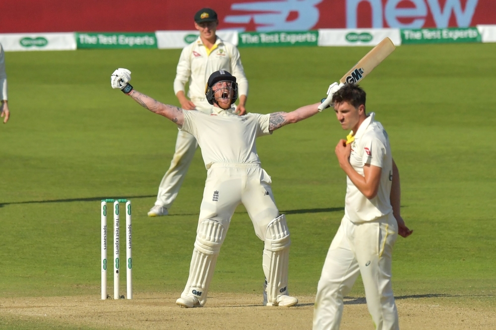 England's Ben Stokes celebrates hitting the winning runs on the fourth day of the third Ashes cricket Test match between England and Australia at Headingley in Leeds, northern England, on Sunday. — AFP