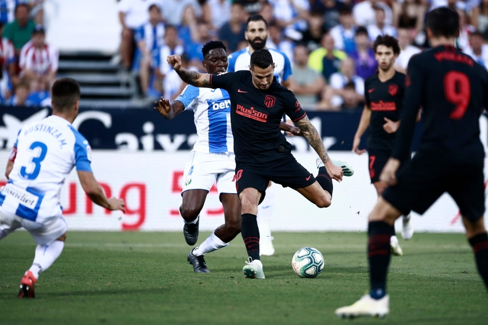 Atletico Madrid's Spanish midfielder Vitolo scores a goal during the Spanish League football match between Leganes and Atletico Madrid at the Butarque stadium in Leganes, southwest of Madrid, on Sunday. — AFP